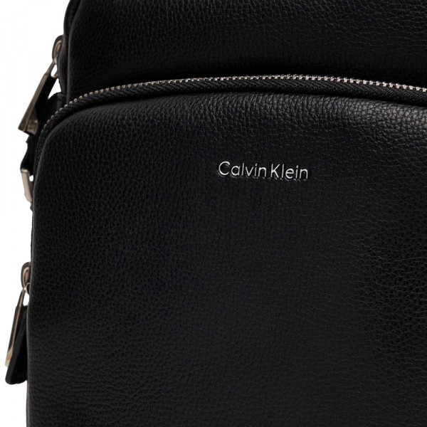 raised-pocket-reporter-crossbody-bag