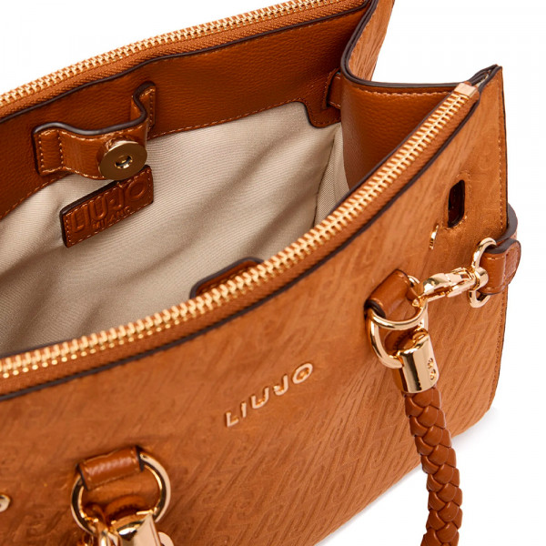 bolso-de-mano-efecto-antelina