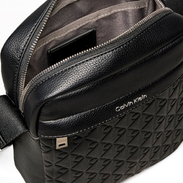 bolso-de-reportero-con-logo-emblematico-grabado