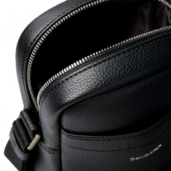 slim-reporter-bag-with-raised-logo-plaque