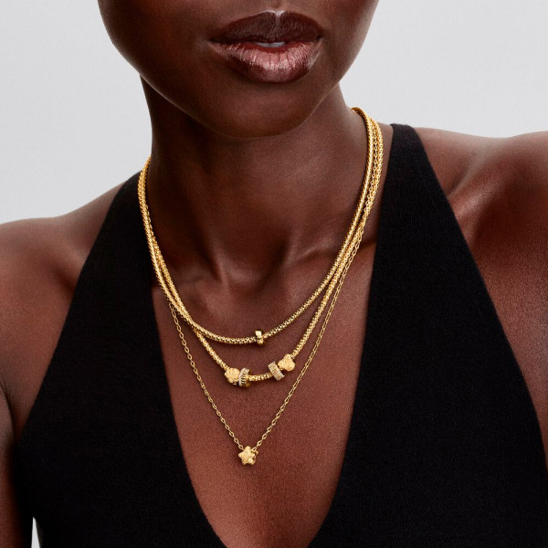 breloque-mini-etoile-texturee-en-or-14-carats-764050c00