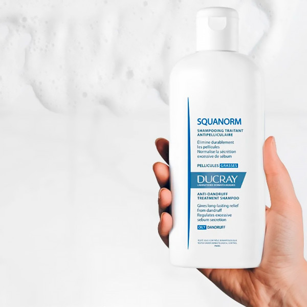 squanorm-anti-schuppen-behandlungsshampoo-fettige-schuppen