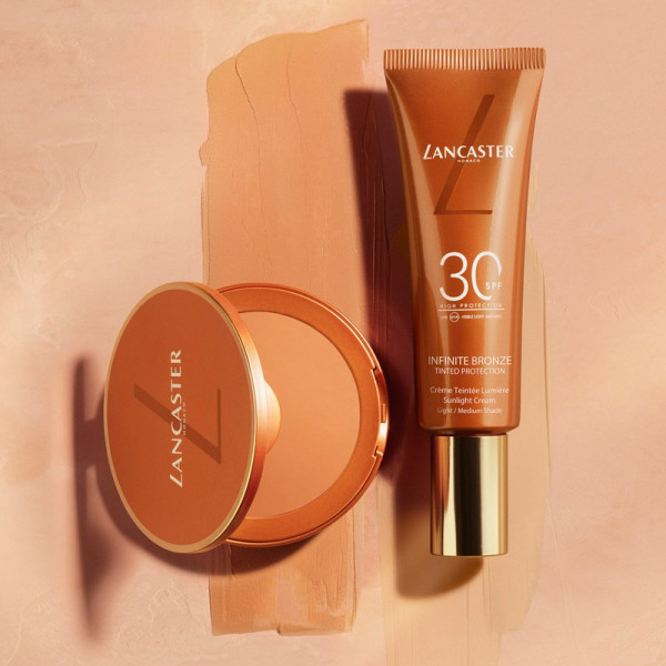 infinite-bronze-protector-solar-facial-spf30-con-maquillaje