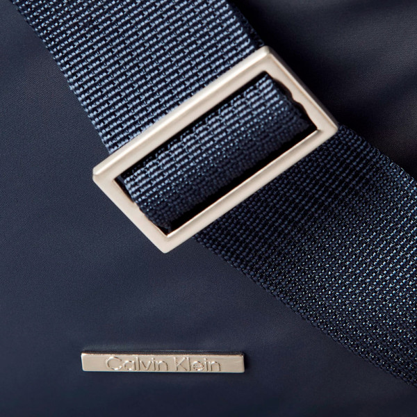 sleek-nylon-reporter-shoulder-bag